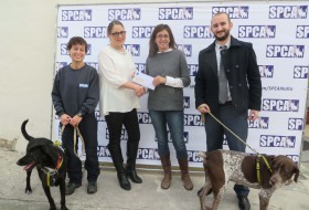 Atlas presents donation to SPCA